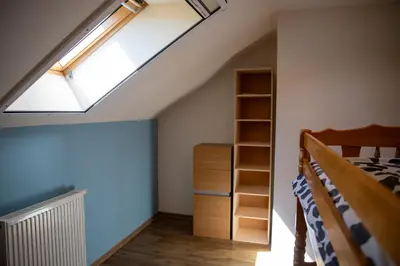 Un ou plusieurs lits dans un hébergement de l'établissement Insolit'appart à la ferme