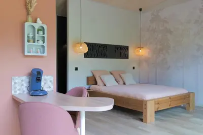 Coin salon dans l'établissement L'écolodgia suite & spa