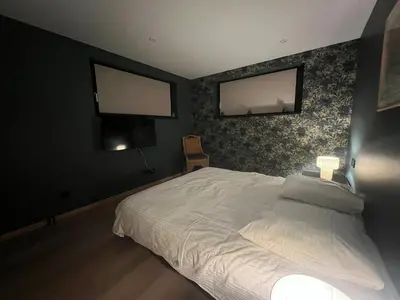 Un ou plusieurs lits dans un hébergement de l'établissement Très beau gîte tout confort