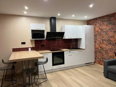 Cuisine ou kitchenette dans l'établissement Très beau gîte tout confort