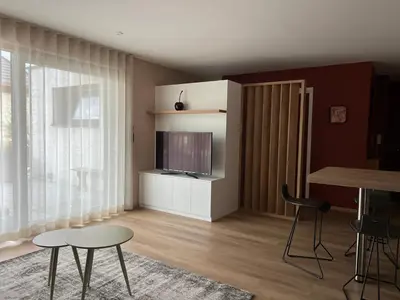 Télévision ou salle de divertissement dans l'établissement Très beau gîte tout confort