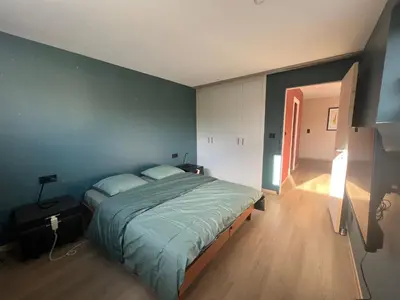 Un ou plusieurs lits dans un hébergement de l'établissement Très beau gîte tout confort