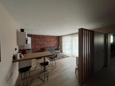 Coin salon dans l'établissement Très beau gîte tout confort