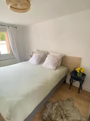 Un ou plusieurs lits dans un hébergement de l'établissement La perle de Gérardmer - Appartement standing 100 m2 au bord du lac