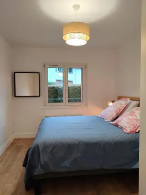 Un ou plusieurs lits dans un hébergement de l'établissement La perle de Gérardmer - Appartement standing 100 m2 au bord du lac