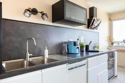 Cuisine ou kitchenette dans l'établissement Nouveau - Vue panoramique Vosges - 90m moderne et Cocoon - Parking et Netflix
