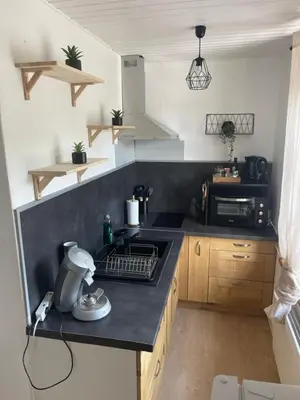 Cuisine ou kitchenette dans l'établissement Prix malin T2 1er étage