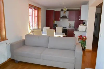 Coin salon dans l'établissement Appartement Timgad