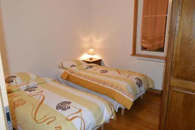 Un ou plusieurs lits dans un hébergement de l'établissement Appartement Timgad