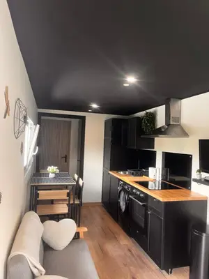 Cuisine ou kitchenette dans l'établissement Au cœur des Vosges