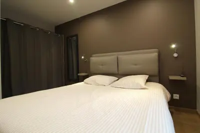 Un ou plusieurs lits dans un hébergement de l'établissement Appartement à La Bresse, proche des lacs, pistes de ski et randonnées
