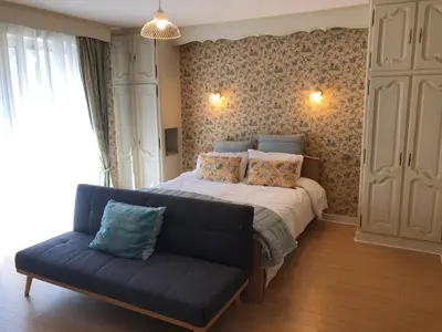 Un ou plusieurs lits dans un hébergement de l'établissement Le Repère du Bien-être - Maison 5 chambres, Sauna, Cinéma