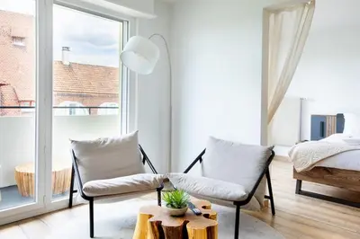 Coin salon dans l'établissement Suite Dreams - Balnéo & Sauna
