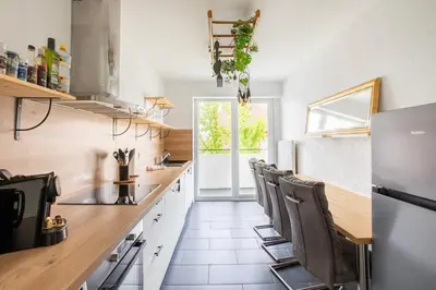 Cuisine ou kitchenette dans l'établissement Suite Dreams - Balnéo & Sauna
