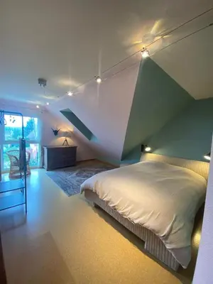 Un ou plusieurs lits dans un hébergement de l'établissement Grande maison de haut standing à 2 min du golf!
