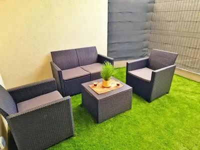 Coin salon dans l'établissement LOFT & SPA-6 Pers-Jacuzzi-Parking-Jardin-Clim-Colmar