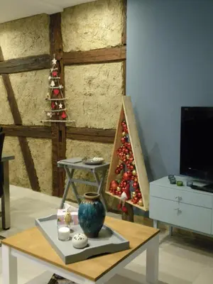 Télévision ou salle de divertissement dans l'établissement Le fournil d'antan