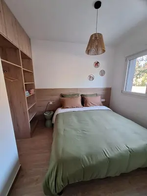 Un ou plusieurs lits dans un hébergement de l'établissement Gîte les Bret'Zen