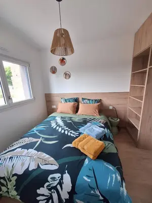 Un ou plusieurs lits dans un hébergement de l'établissement Gîte Air'Zen