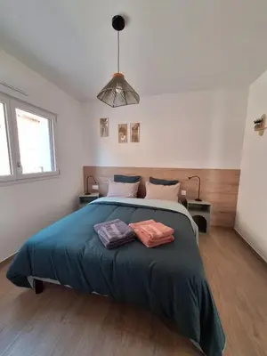 Un ou plusieurs lits dans un hébergement de l'établissement Gîte Air'Zen