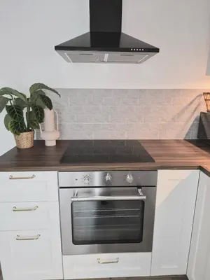 Cuisine ou kitchenette dans l'établissement Chez mamy