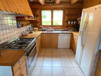 Cuisine ou kitchenette dans l'établissement Chalet Rondins des bois Lac Xonrupt