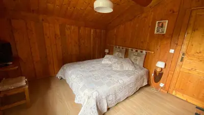 Un ou plusieurs lits dans un hébergement de l'établissement Chalet Rondins des bois Lac Xonrupt