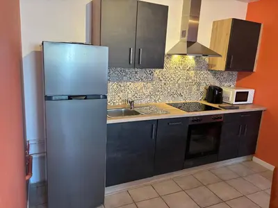 Cuisine ou kitchenette dans l'établissement La Vue des Vignes