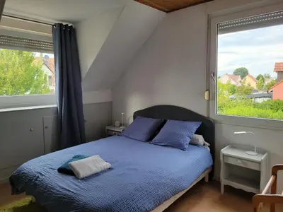 Un ou plusieurs lits dans un hébergement de l'établissement La maison des Cigognes