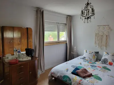 Un ou plusieurs lits dans un hébergement de l'établissement La maison des Cigognes