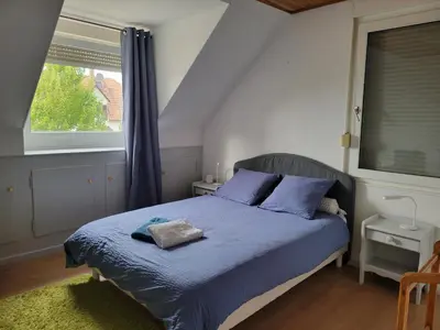Un ou plusieurs lits dans un hébergement de l'établissement La maison des Cigognes