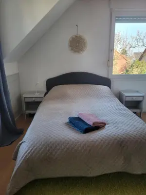 Un ou plusieurs lits dans un hébergement de l'établissement La maison des Cigognes