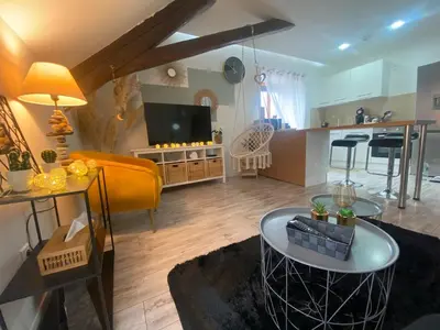 Cuisine ou kitchenette dans l'établissement Cocon Anaïs