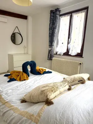 Un ou plusieurs lits dans un hébergement de l'établissement Le Nid du Veilleur-10min de Colmar