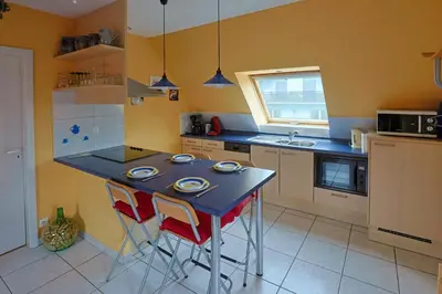 Cuisine ou kitchenette dans l'établissement Gite du Vignoble