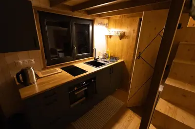 Cuisine ou kitchenette dans l'établissement Tiny house à la ferme
