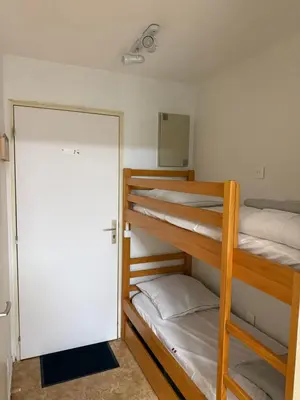 Un ou plusieurs lits dans un hébergement de l'établissement Studio cosy avec terrasse & vue sur pistes