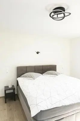 Un ou plusieurs lits dans un hébergement de l'établissement Gîte familial pied des montagnes