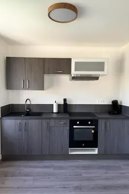 Cuisine ou kitchenette dans l'établissement Gîte familial pied des montagnes