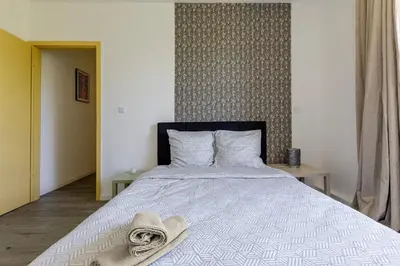 Un ou plusieurs lits dans un hébergement de l'établissement Appartement Tonga - Dans Mulhouse pour 6p