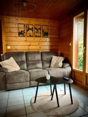 Coin salon dans l'établissement Le chalet du Hibou