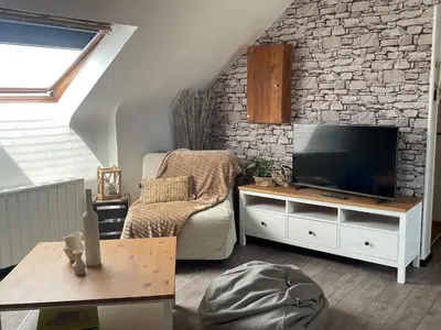 Télévision ou salle de divertissement dans l'établissement Chez Storcki