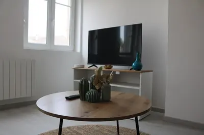 Télévision ou salle de divertissement dans l'établissement L'illwald I