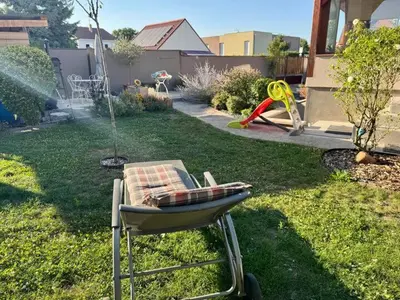 Jardin de l'établissement Appartement moderne, neuf et tout confort