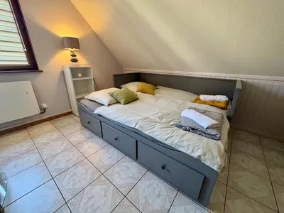 Un ou plusieurs lits dans un hébergement de l'établissement Maison familiale, authentique, confort et calme