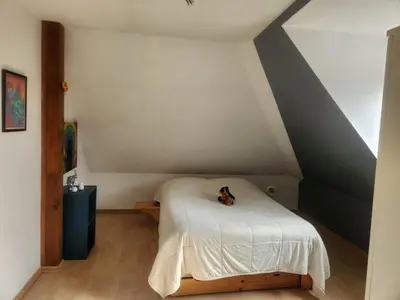 Un ou plusieurs lits dans un hébergement de l'établissement Appartement cosy à 5mn du Parc des Expositions