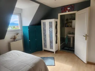 Un ou plusieurs lits dans un hébergement de l'établissement Appartement cosy à 5mn du Parc des Expositions