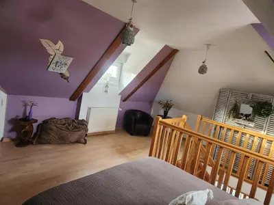 Coin salon dans l'établissement Appartement cosy à 5mn du Parc des Expositions