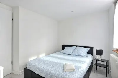 Un ou plusieurs lits dans un hébergement de l'établissement Le Repaire du Lion - Quadruplex - 10 voyageurs