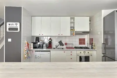 Cuisine ou kitchenette dans l'établissement Le Repaire du Lion - Quadruplex - 10 voyageurs